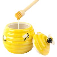 Honingpot ø10x11 cm geel met houten honingstokje